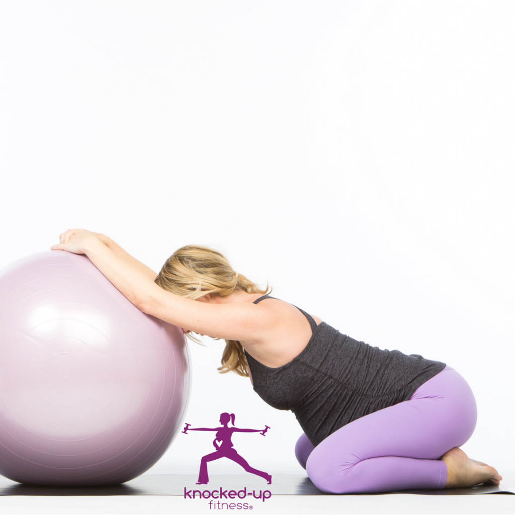 picture of a woman doing pregnancy stretches with pictures